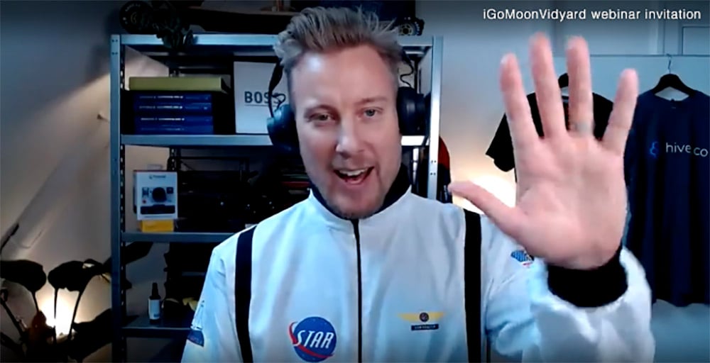 Mattias speaking in webinar while wearing his spacesuit 