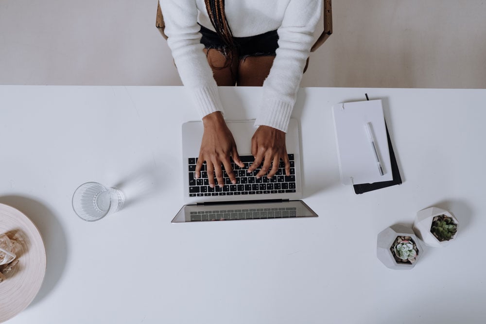 woman-blogging-white-long-sleeved-top