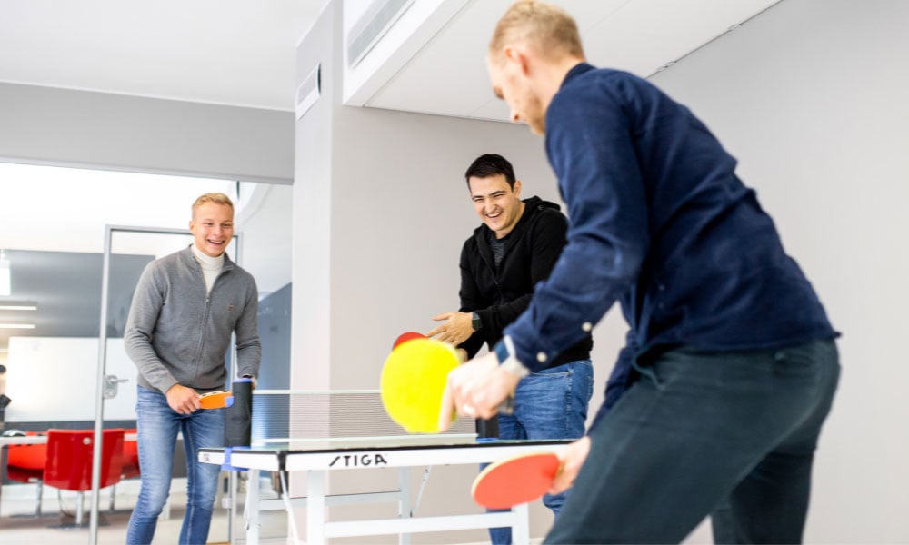 alexander playing table tennis with the team at igomoon