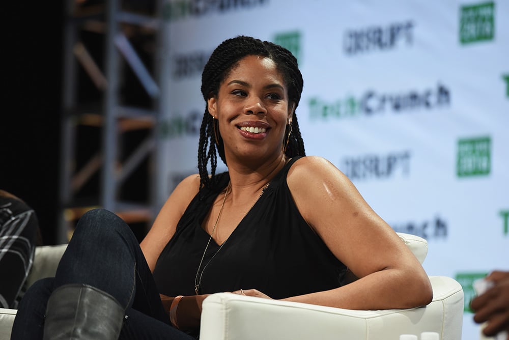 Erica baker on a stage for guest panel 